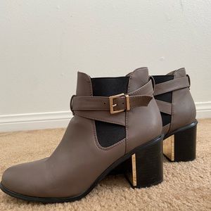 Boots with gold tone detailing